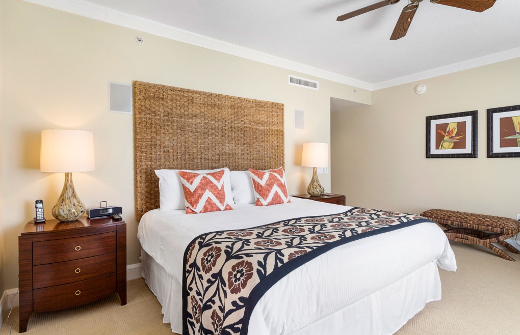 The spacious master bedroom features a king-size bed